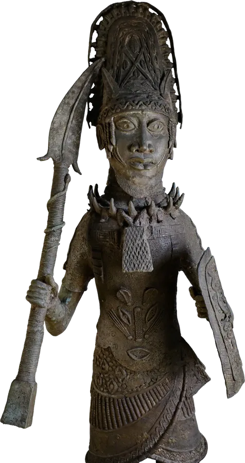 A bronze warrior figure.